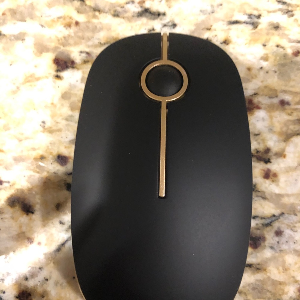 Wireless Mouse black with gold like trim. Sharp looking on your desk. NIOB 2.4G